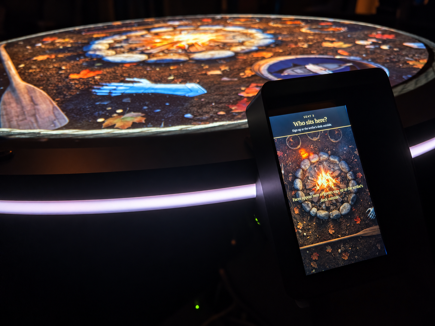 Close-up of The Round Table’s projected game and individual player touchscreen.